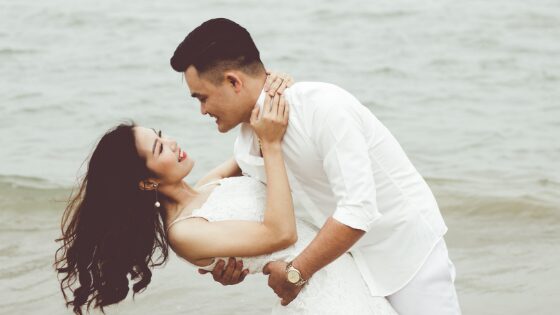 A happy couple by the beach