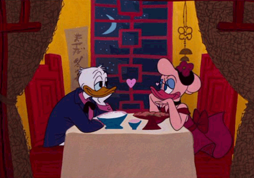 A couple looking at each other on a date